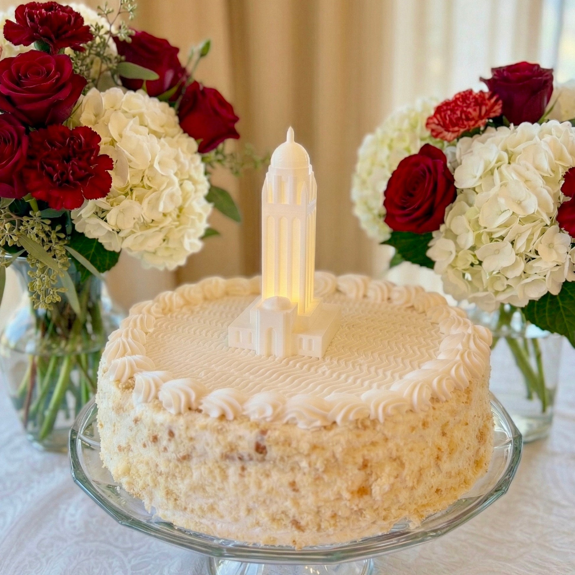 The Stanford cake topper figurine designed with an LED light and as the Hoover Tower building on campus, shown on a groom's cake for Stanford alumni.