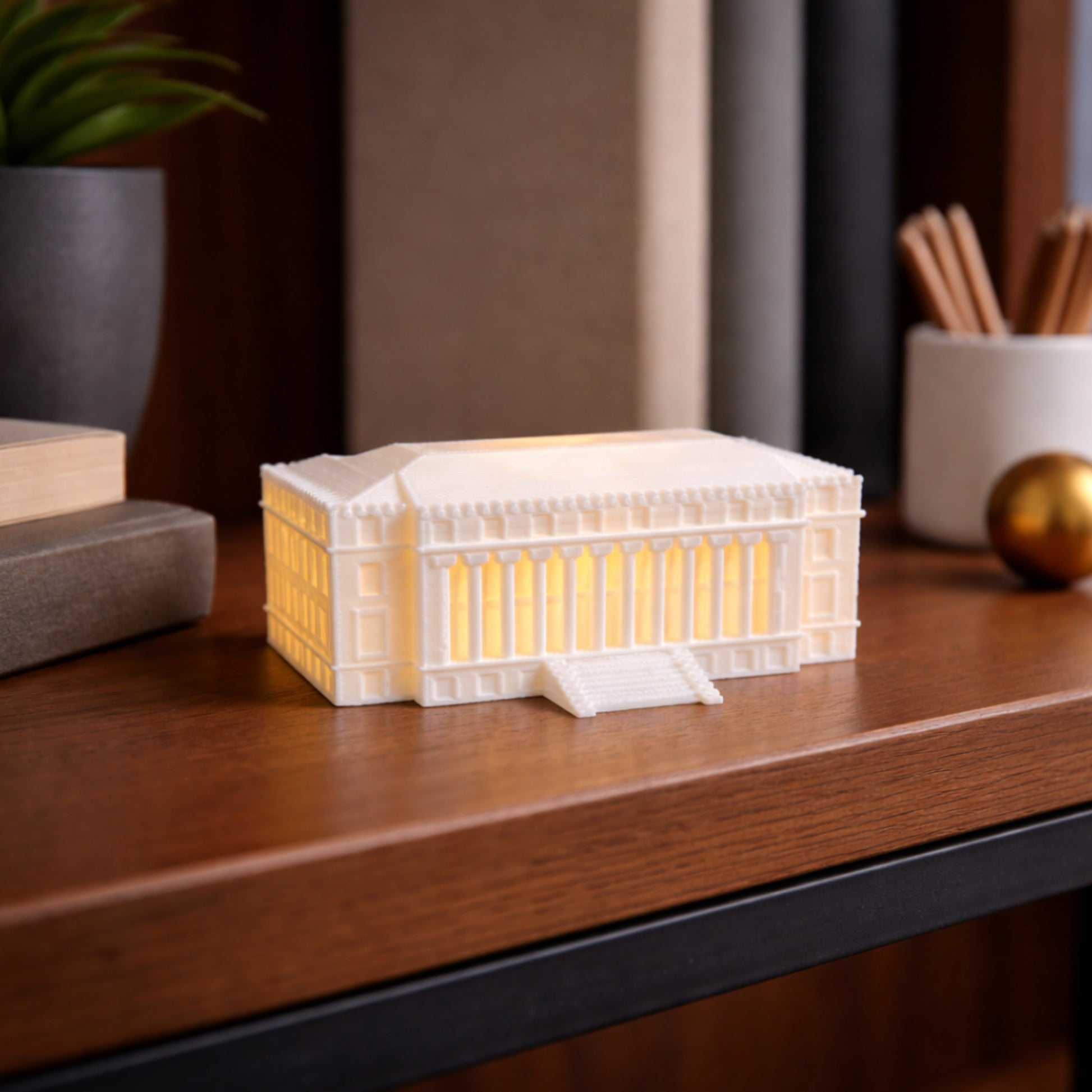 The Texas A&M LED light representing the Administration Building, used as Aggie office decor.