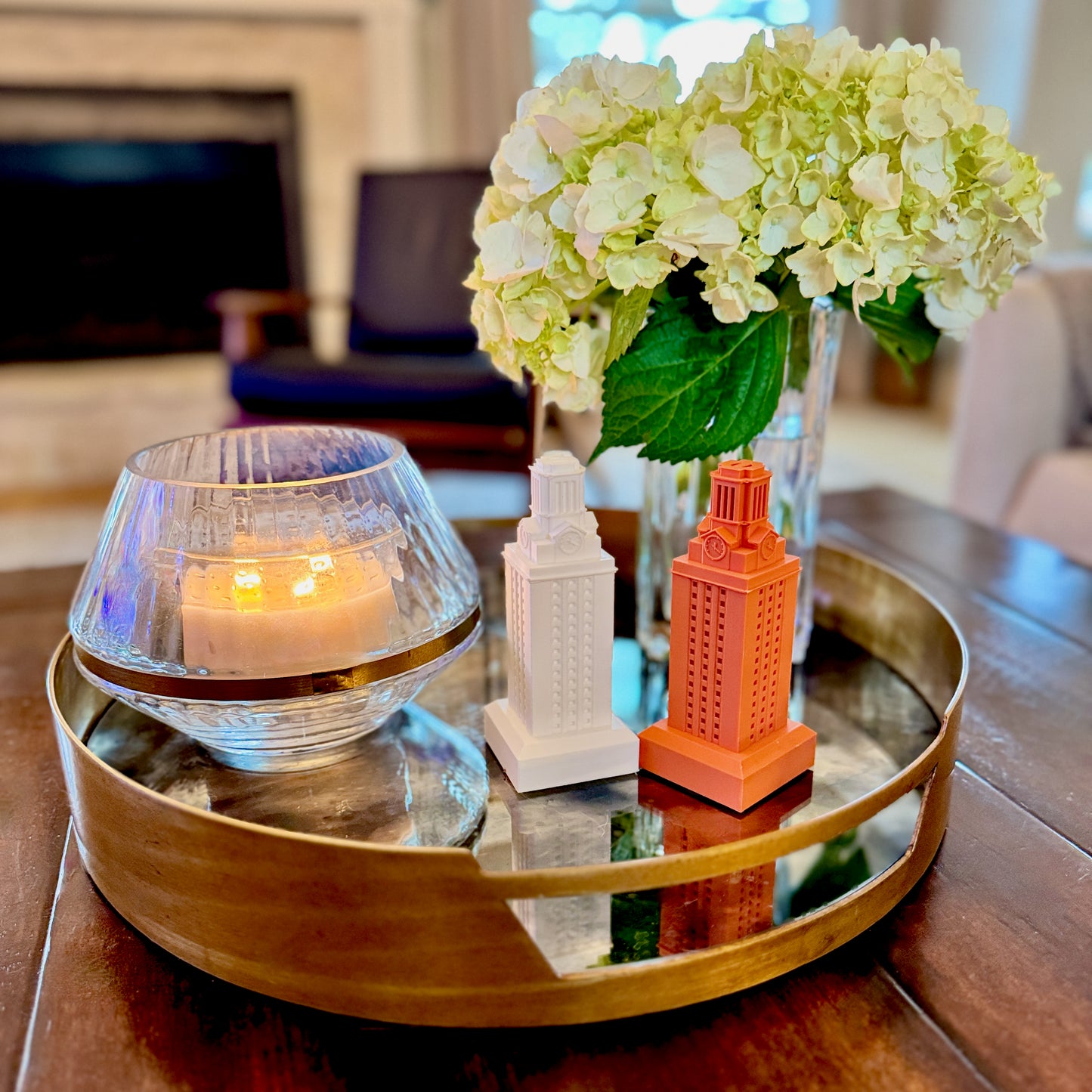 Decorative UT Austin Tower figurines inspired by the iconic university landmark.