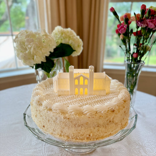 The UCLA cake topper light, shown on a college graduation cake