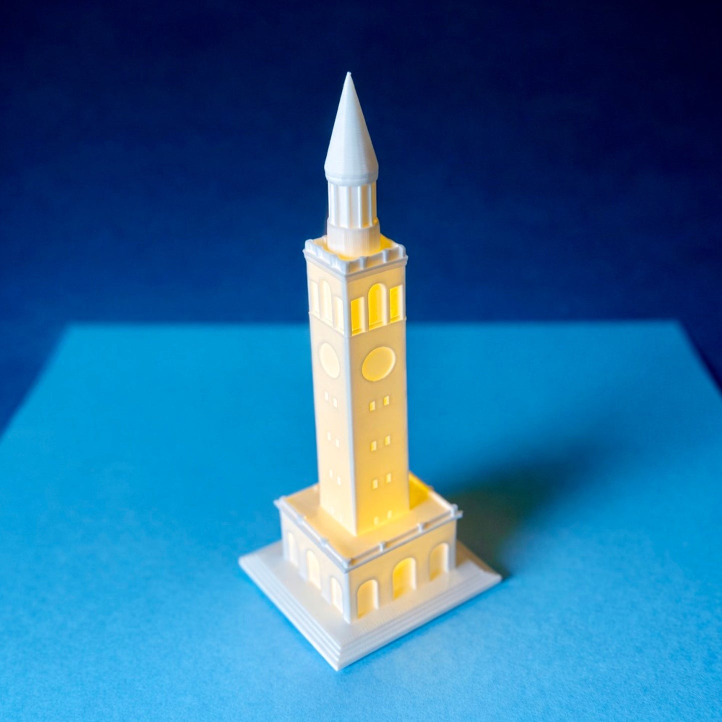 The UNC Chapel Hill figurine, designed as a replica of the bell tower building on campus and shown with an LED light.