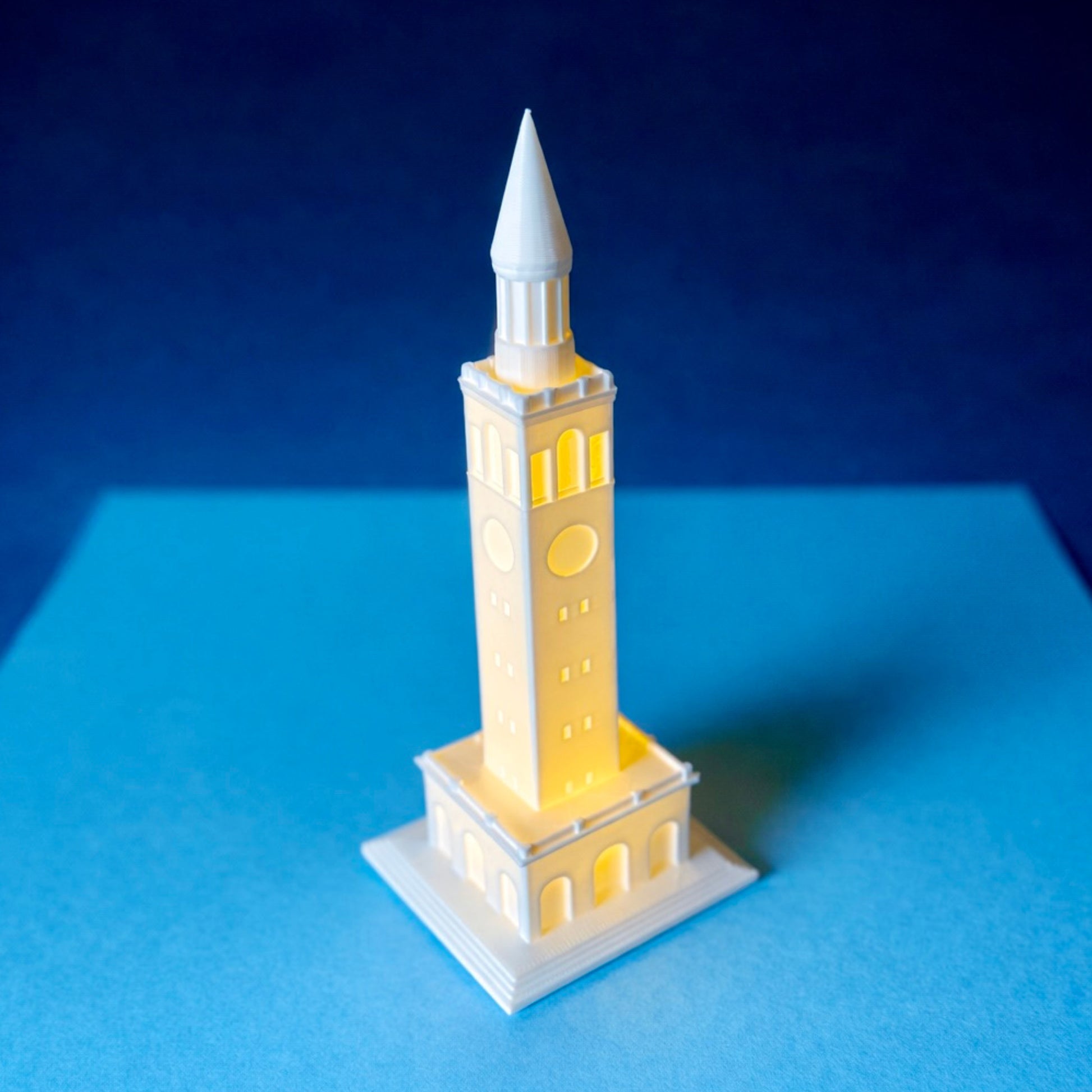 The UNC Chapel Hill figurine, designed as a replica of the bell tower building on campus and shown with an LED light.