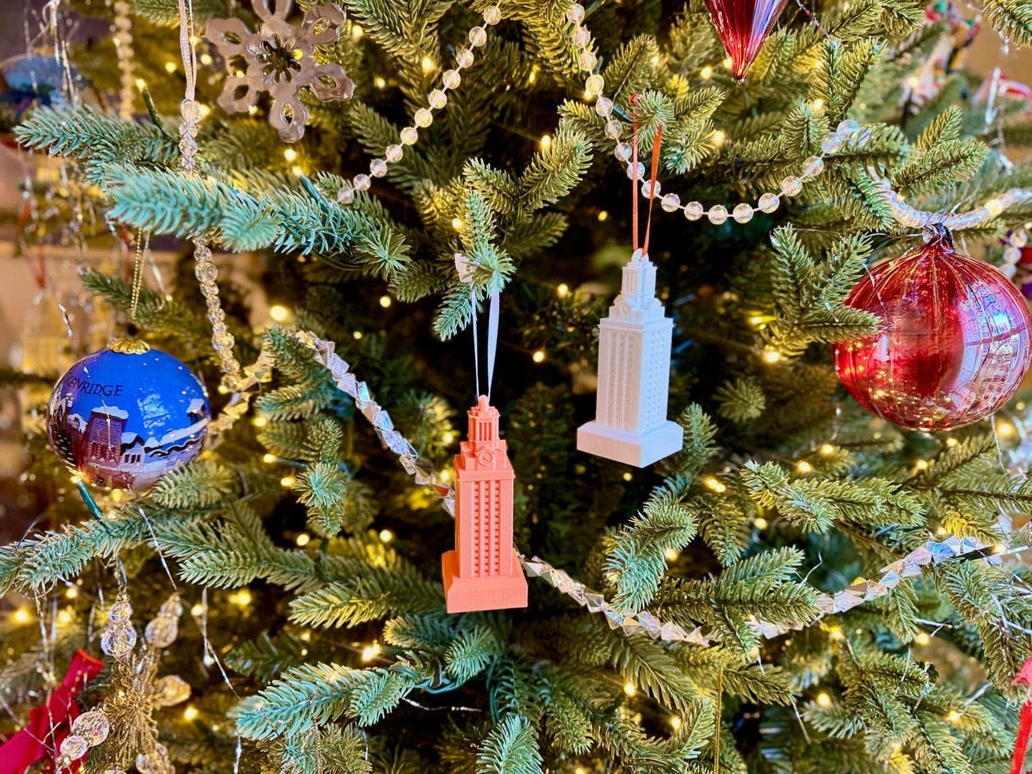 UT Tower ornaments shown on a Longhorn tree.
