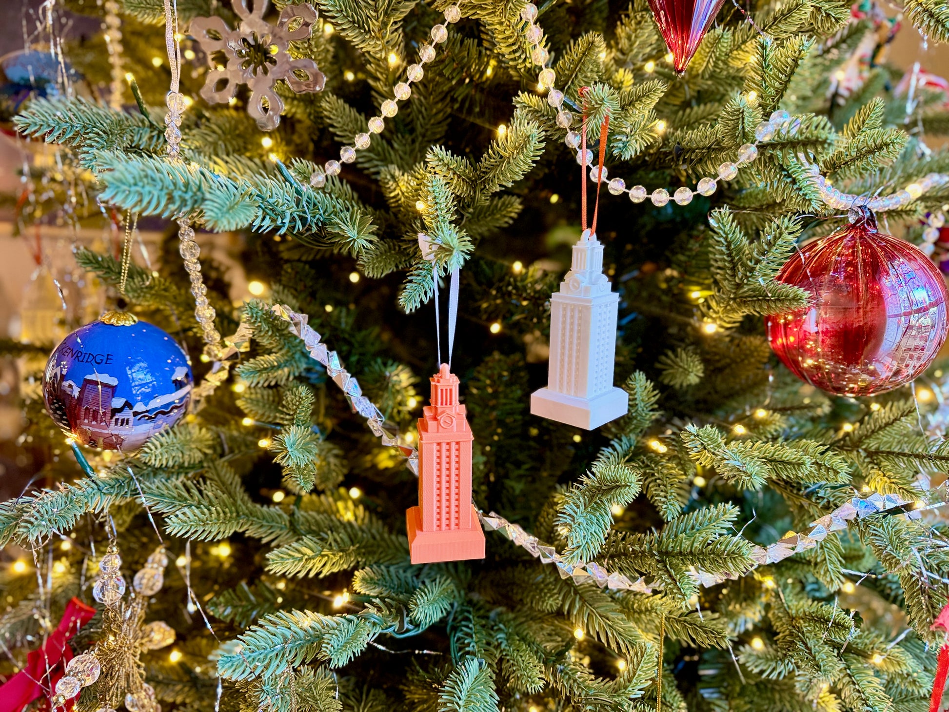 UT Tower ornaments shown on a Longhorn tree.