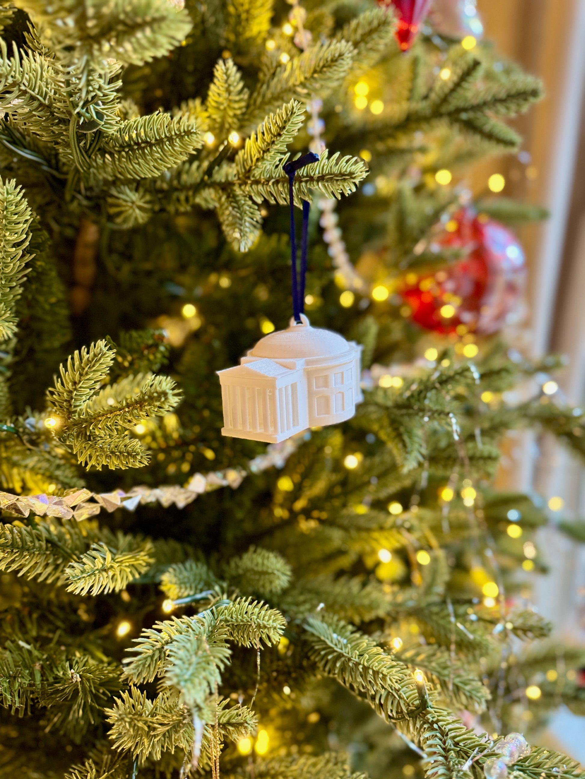 UVA Rotunda ornament on a Christmas tree.