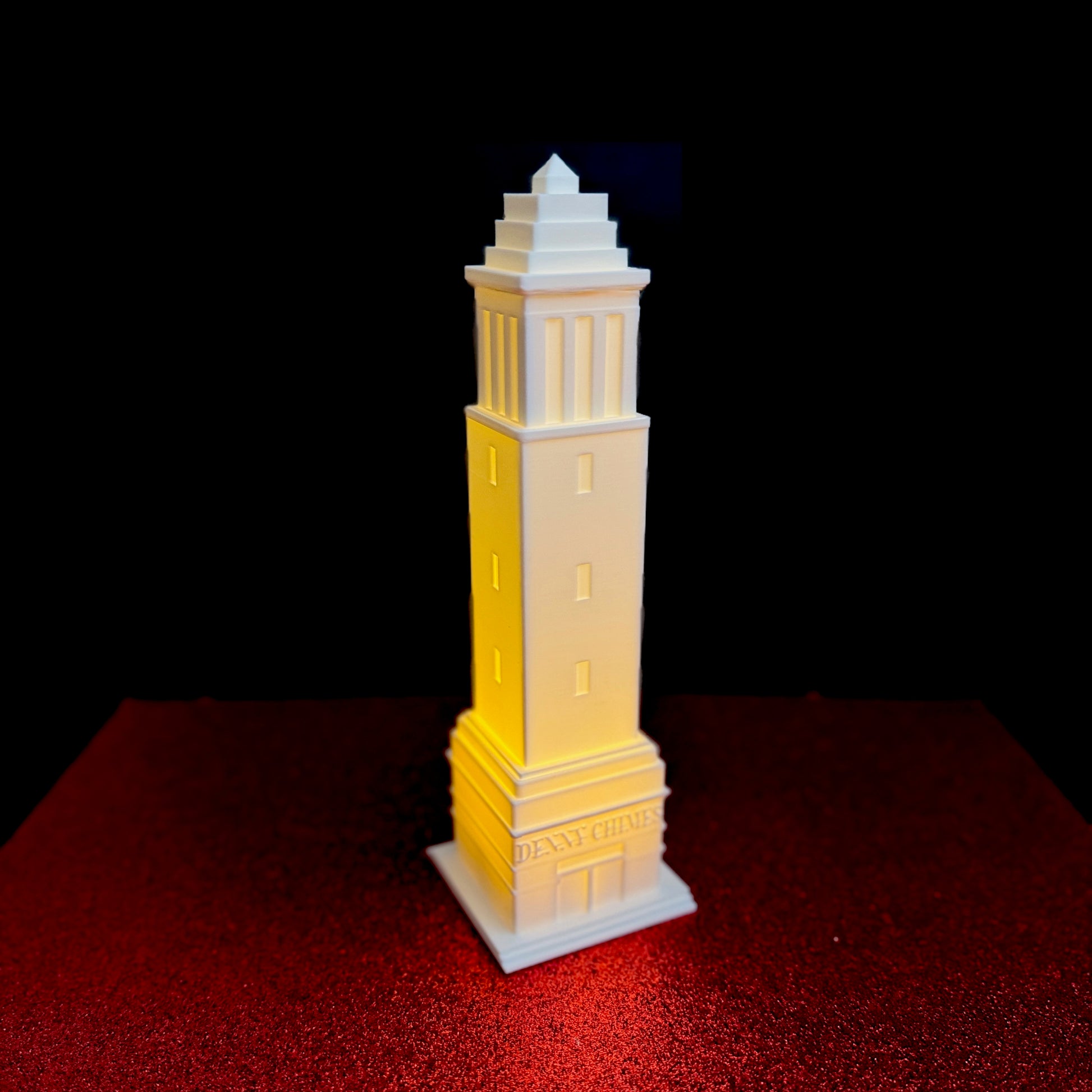 The lighted figurine for University of Alabama fans, designed as the Denny Chimes Tower.
