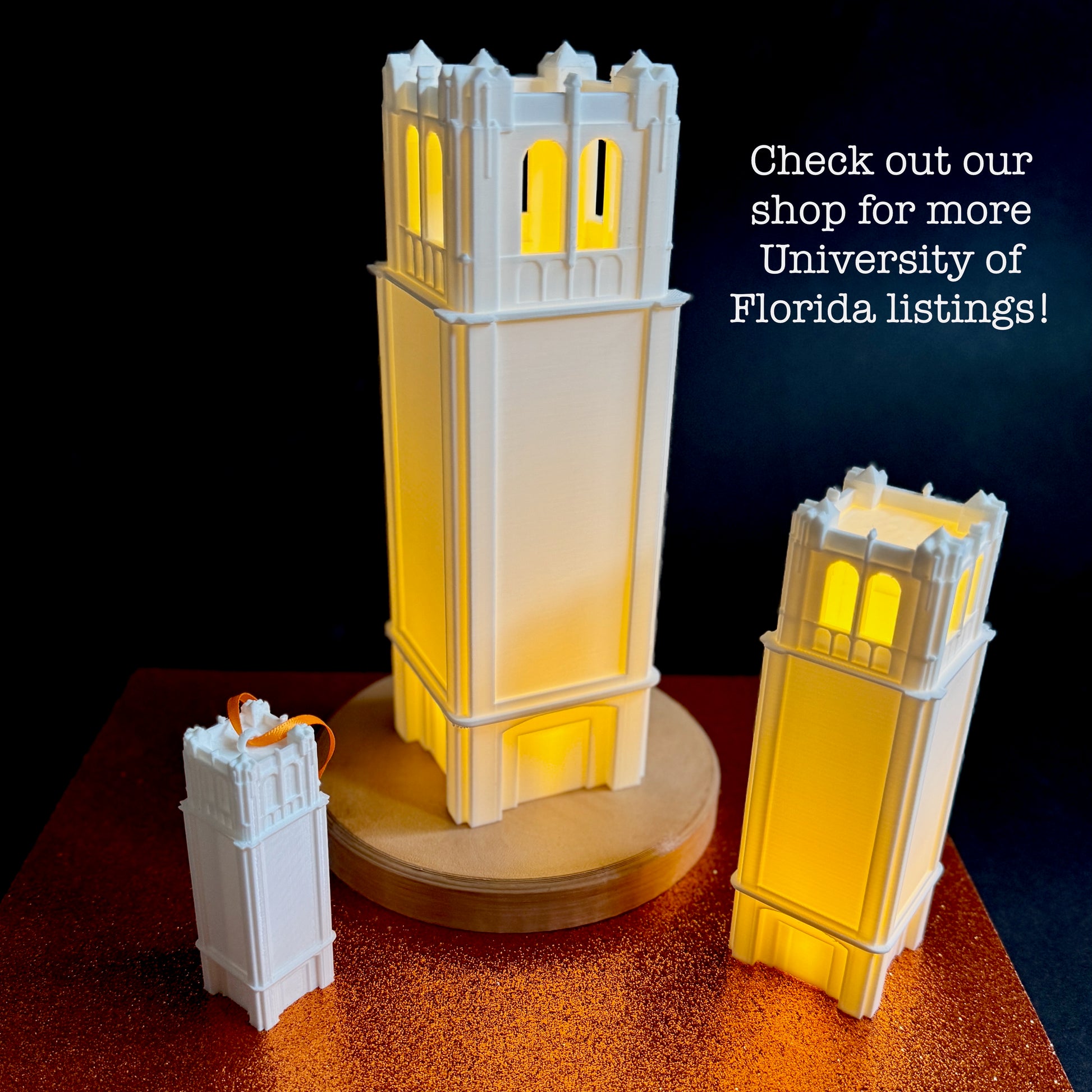 The Century Tower lights, shown next to the University of Florida ornament.