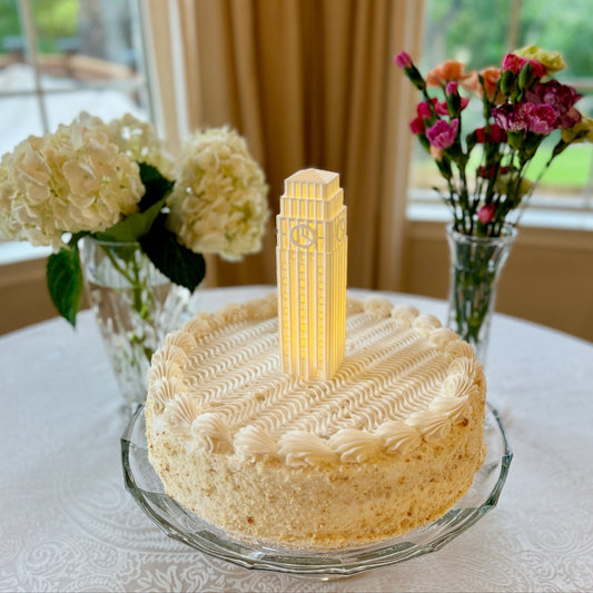 The University of Michigan cake topper light, depicting the Burton Tower.