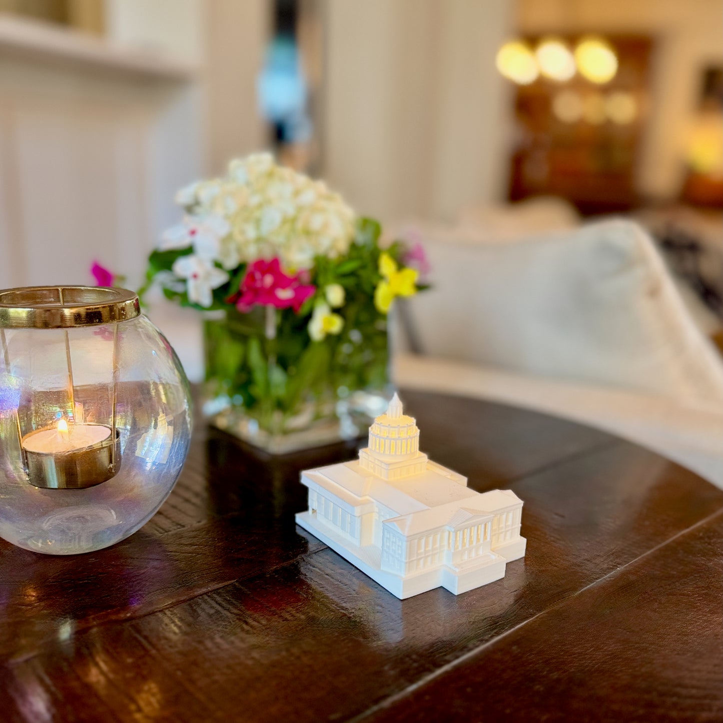 The University of Rochester figurine shown as a dorm decoration on a side table.