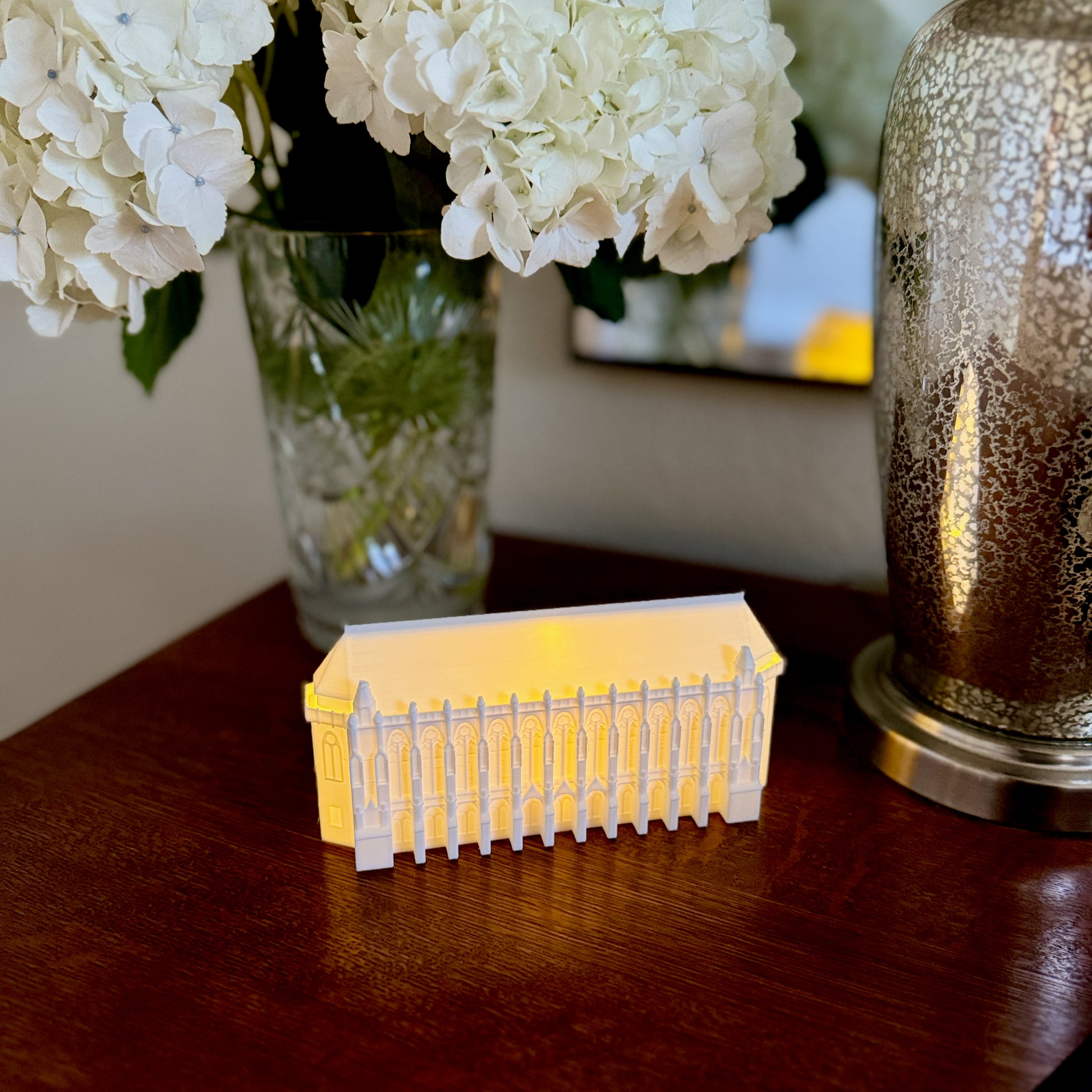 The University of Washington light, shown on a side table and used as dorm decor.