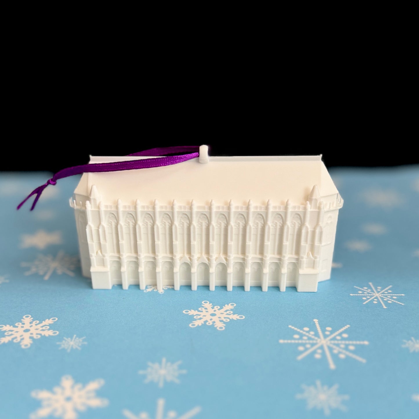 Detailed view of the UW ornament depicting the Suzzallo Library.