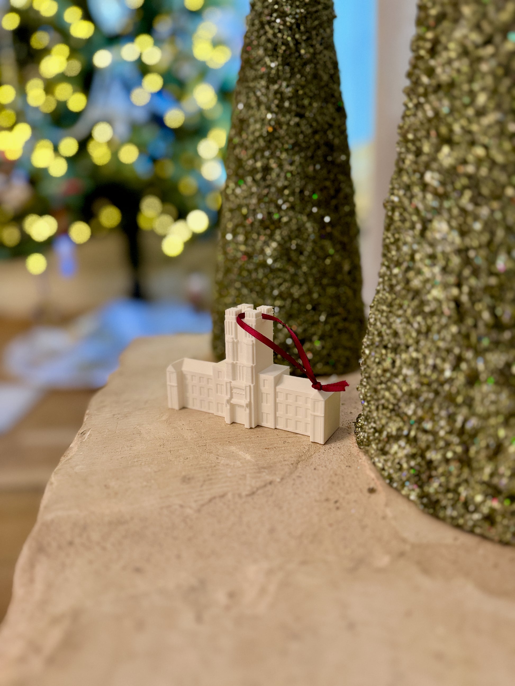 Virginia Tech Christmas decor designed as replicas of the Burruss Hall building.