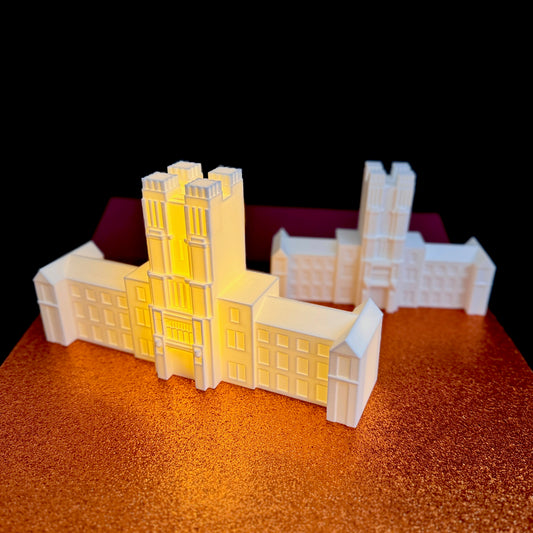 Virginia Tech figurines shown side by side as graduation or alumni gifts.
