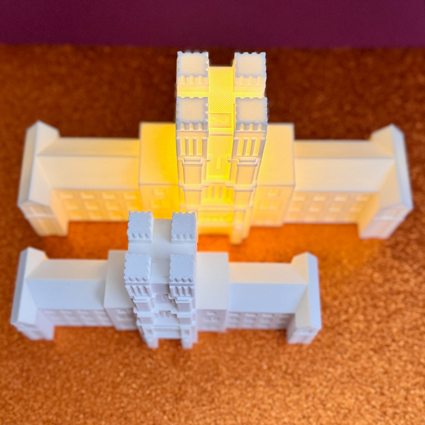 Hokie graduation gift idea featuring two Burruss Hall figurines with optional LED light version