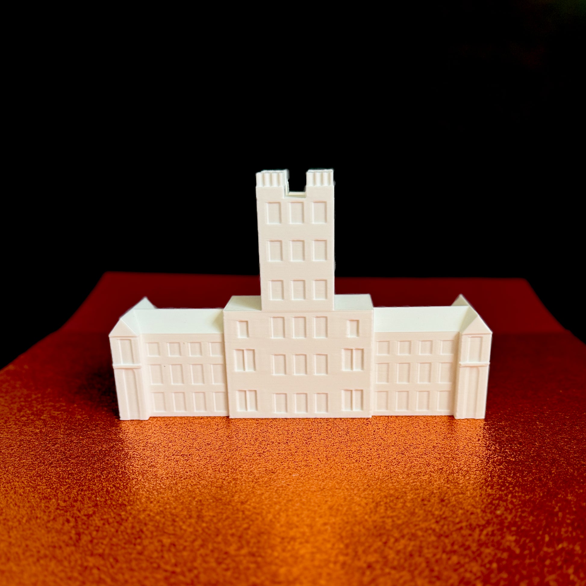 Rear view of the Virginia Tech figurine representing Burruss Hall.