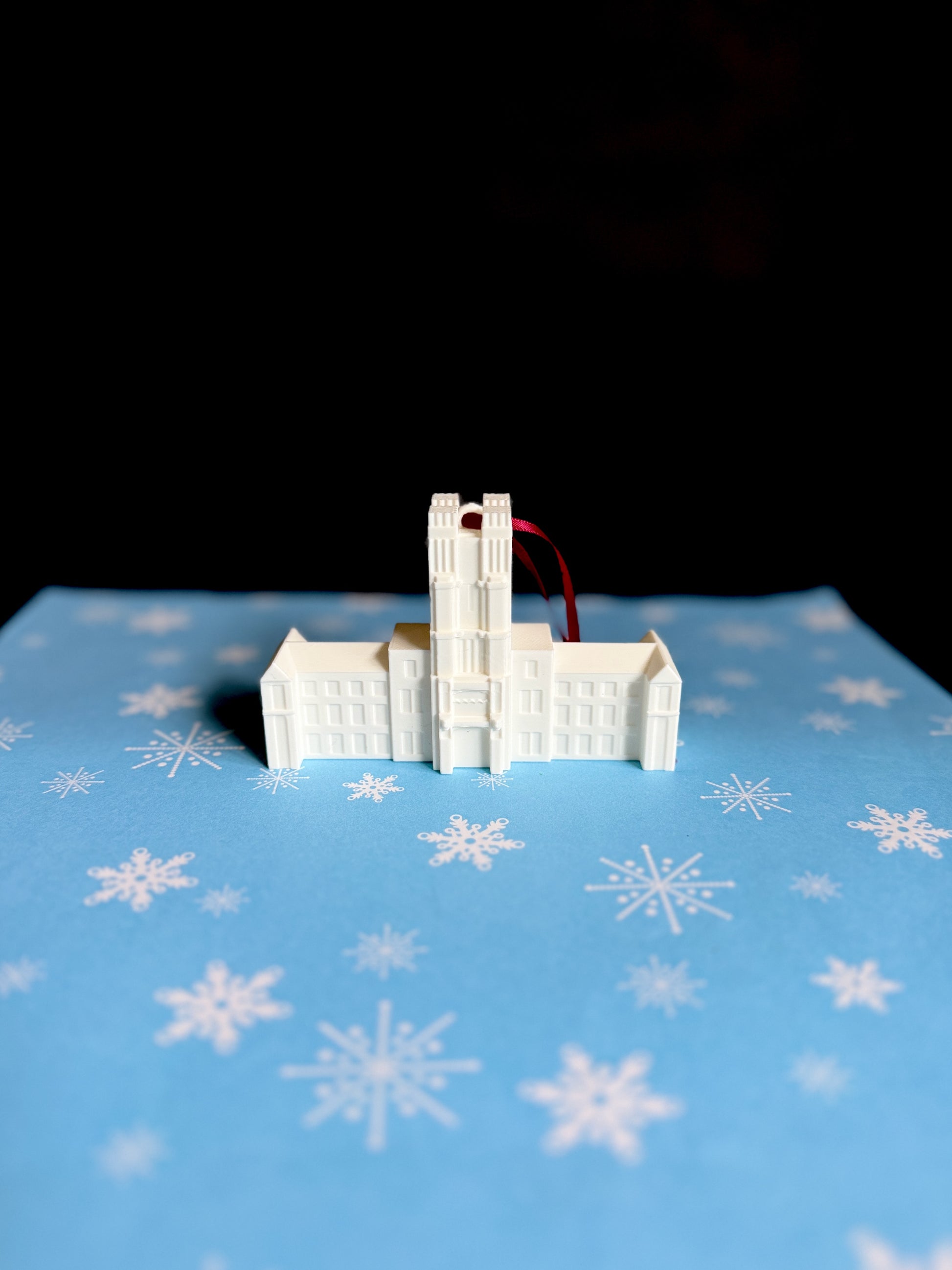 Virginia Tech alumni ornament designed as Burruss Hall.