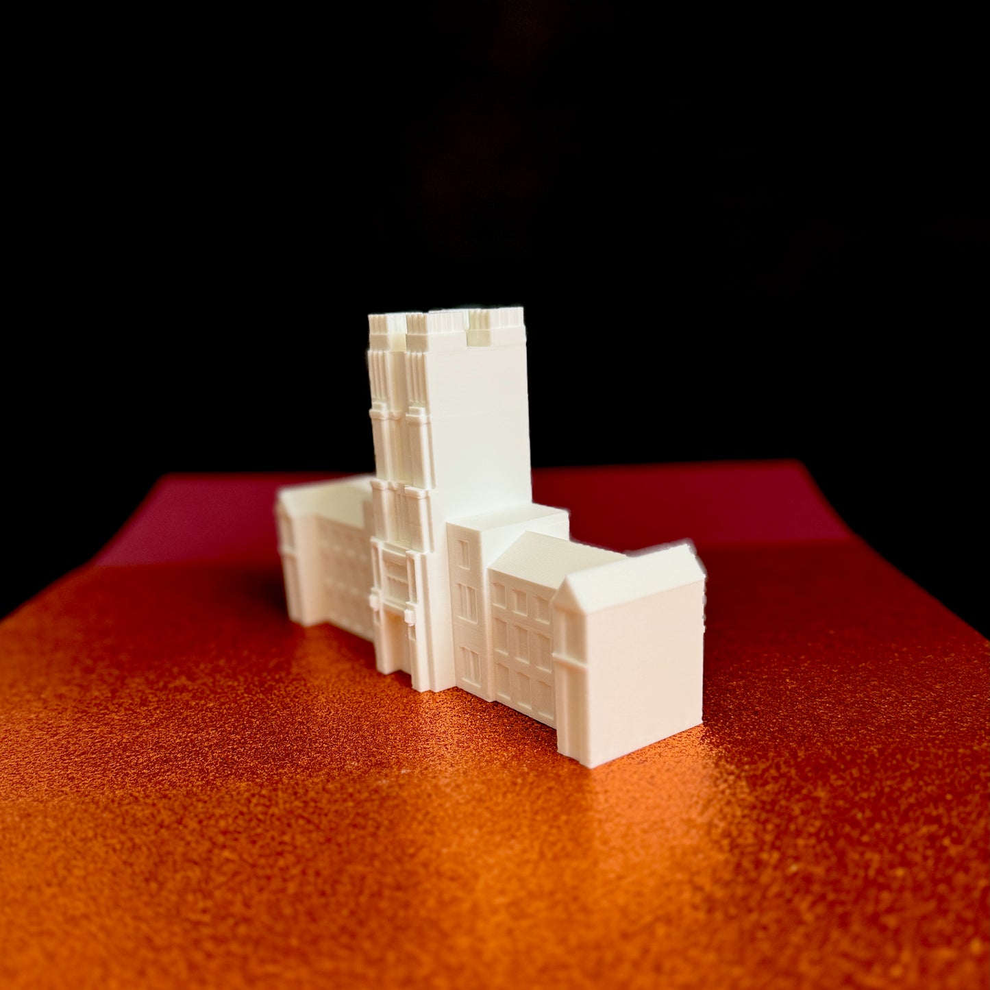 Virginia Tech party decoration, a figurine designed as a replica of Burruss Hall.