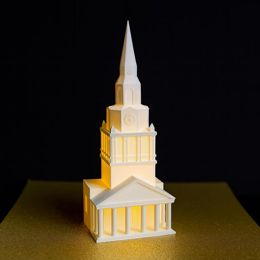 The LED lighted Wake Forest figurine representing Wait Chapel, used as an alumni gift.