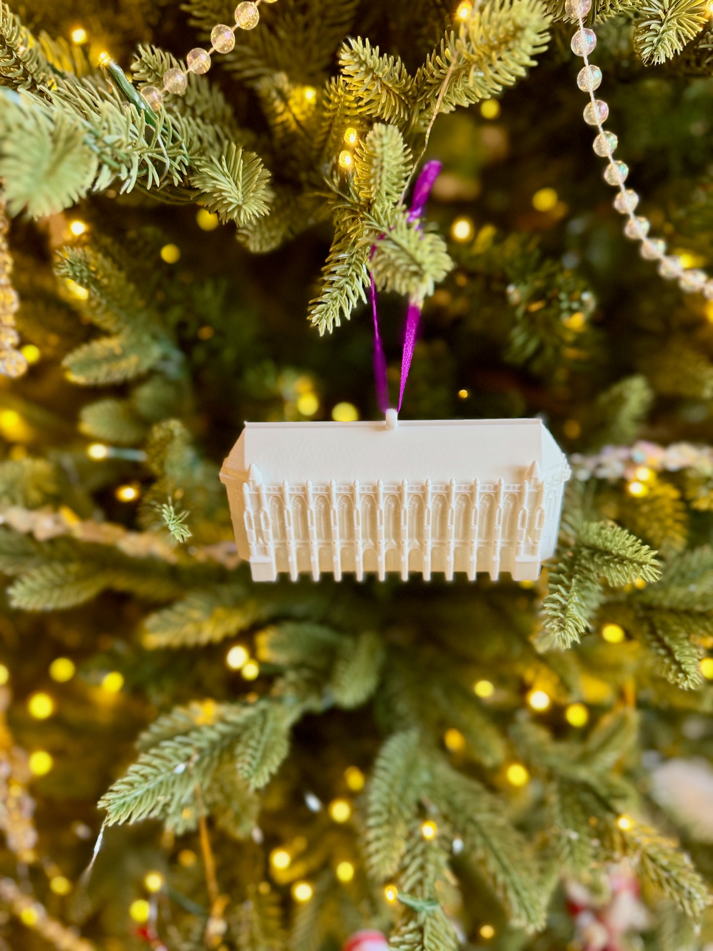 A Washington Huskies ornament designed as the Suzzallo library.