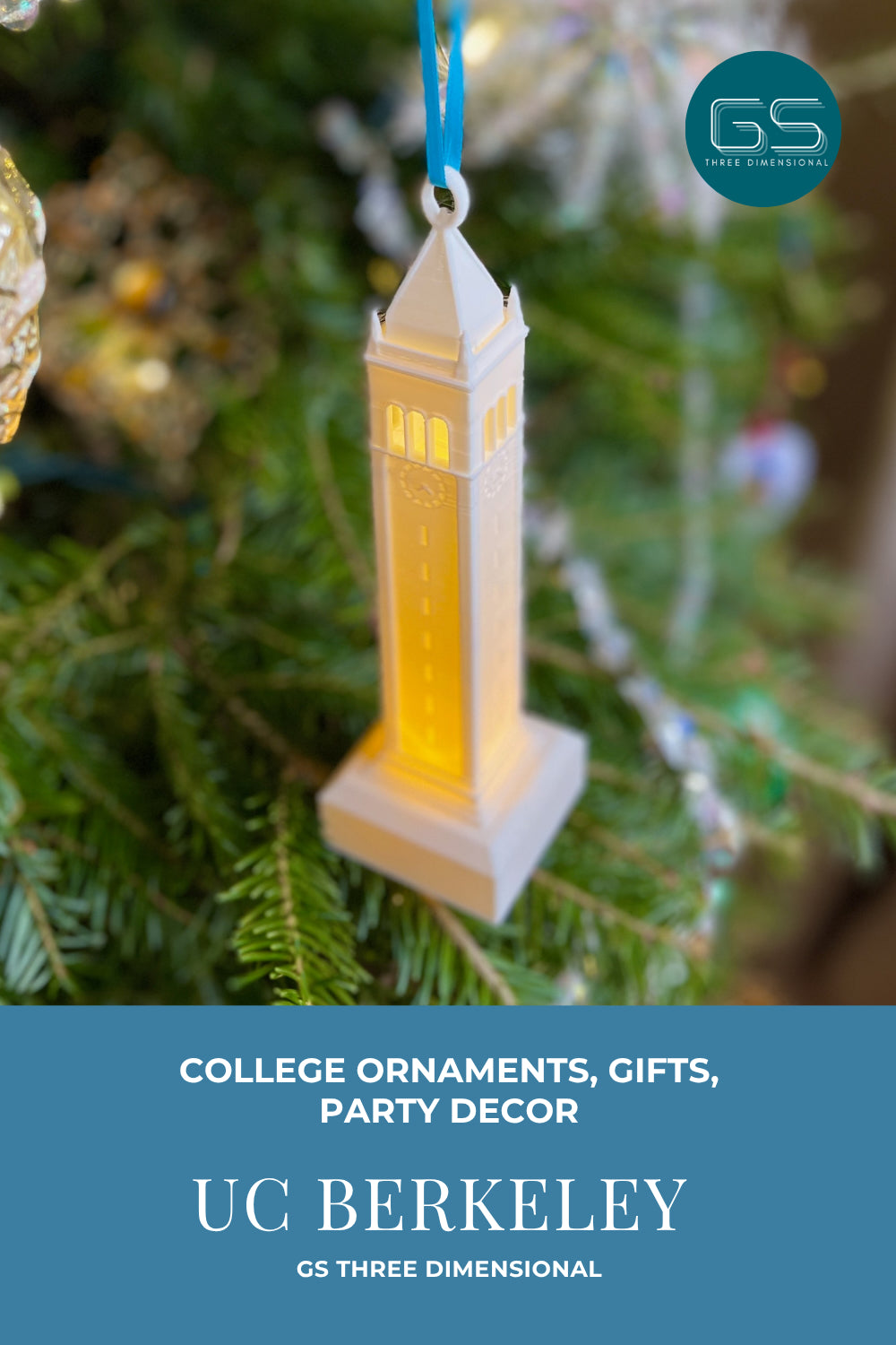 Berkeley Sather Tower ornament with LED light, shown on a Christmas tree with GS Three Dimensional branding.