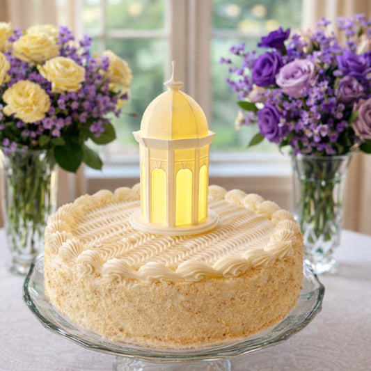 The East Carolina University cake topper figurine, designed as the ECU Cupola building on campus