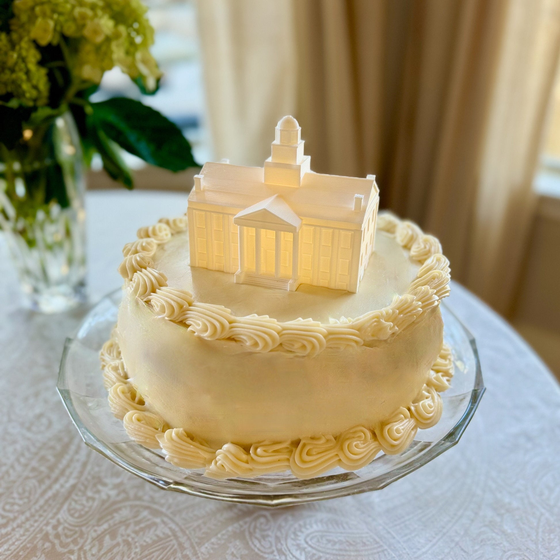 The University of Iowa cake topper, shown on an Iowa graduation cake.