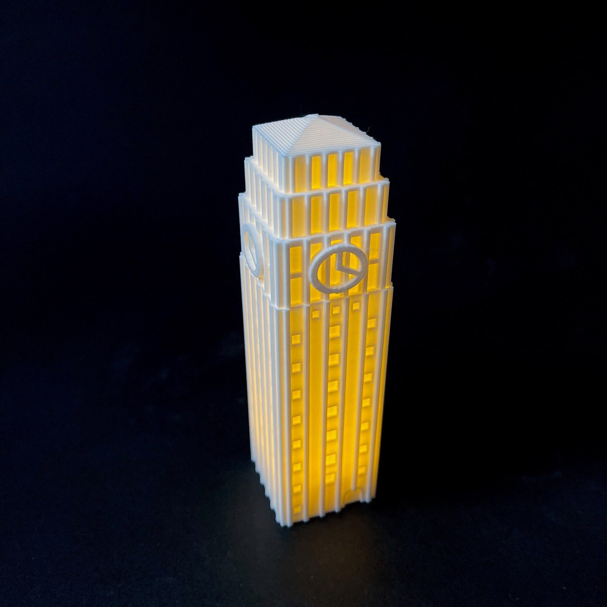 The University of Michigan lighted figurine of the Burton Memorial Tower.